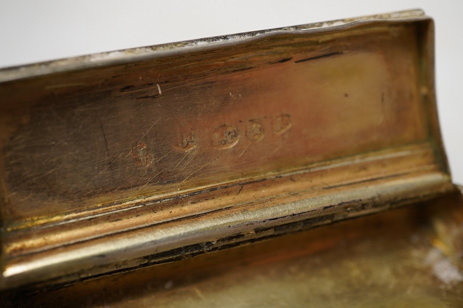 A George III silver ovoid snuff box, with engraved monogram, Samuel Pemberton, Birmingham, 1804, 59mm.